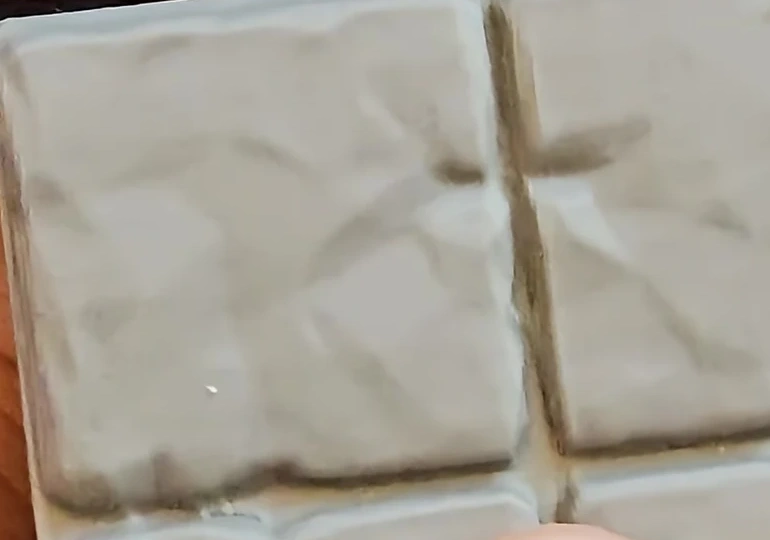 Close-up of the real stone surface and tile edges